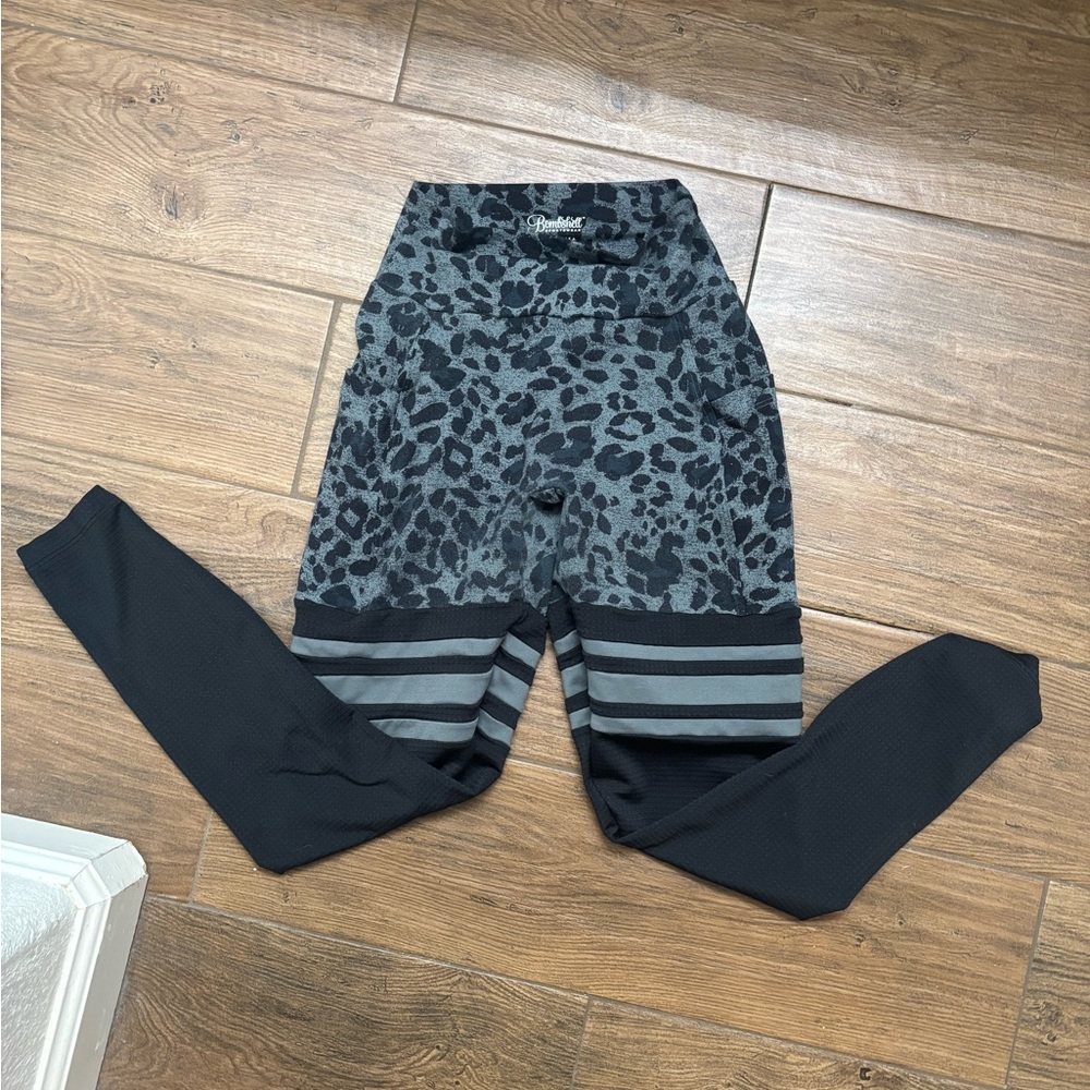 Slightly worn bombshell knee high leopard print leggings